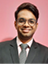 A man wearing a suit and tie. Description generated by AI